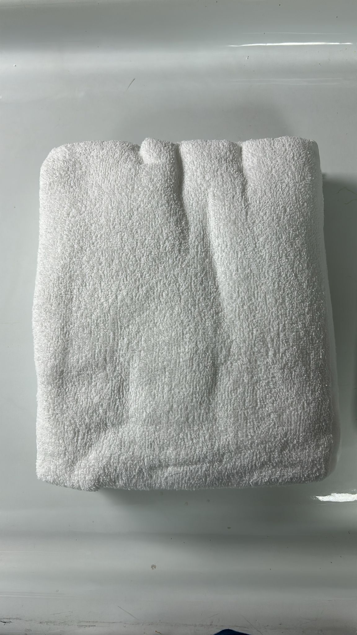 Folded white Turkish cotton Ihram